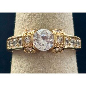 Gold-Tone Womens Ring With AAA Cubic Zirconia Stones & Round Centerpiece